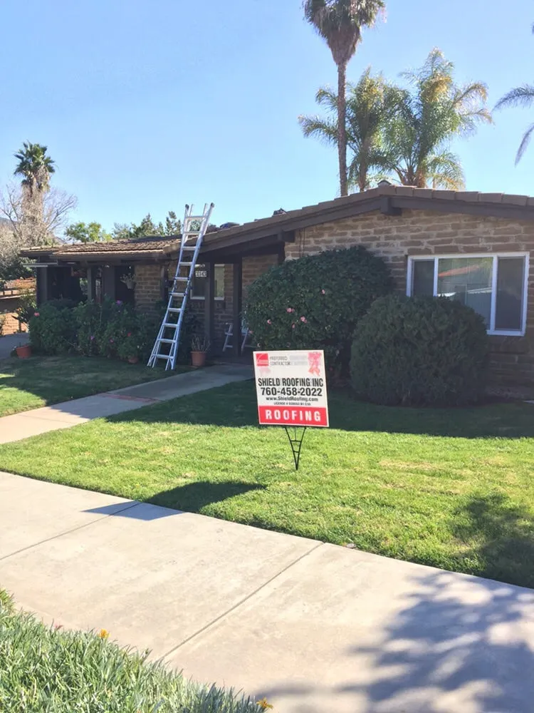Slide of Shield Roofing