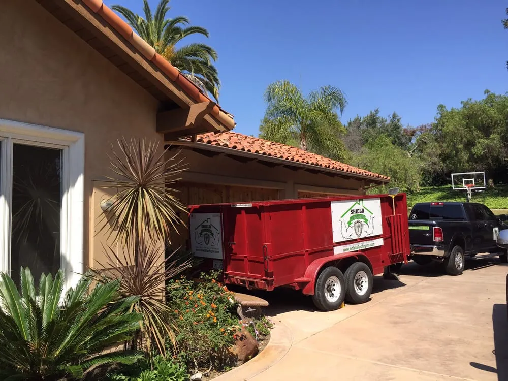 Slide of Shield Roofing