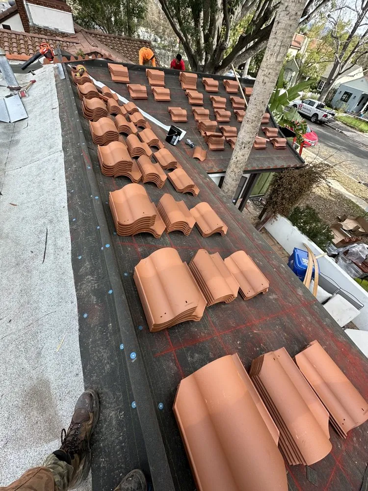 Slide of Shield Roofing