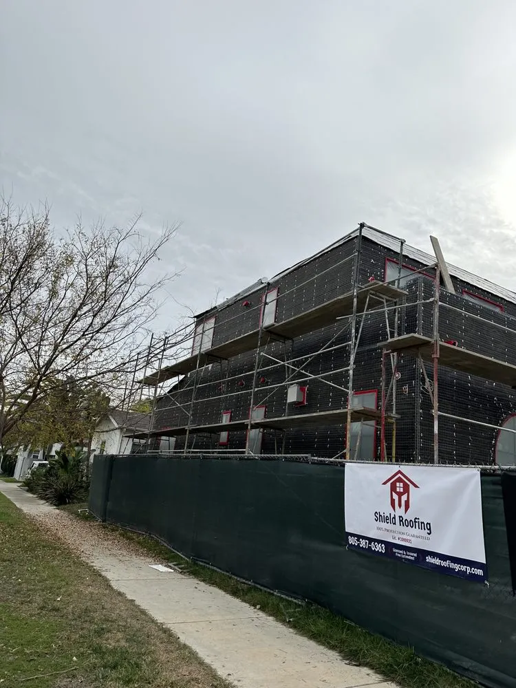 Slide of Shield Roofing