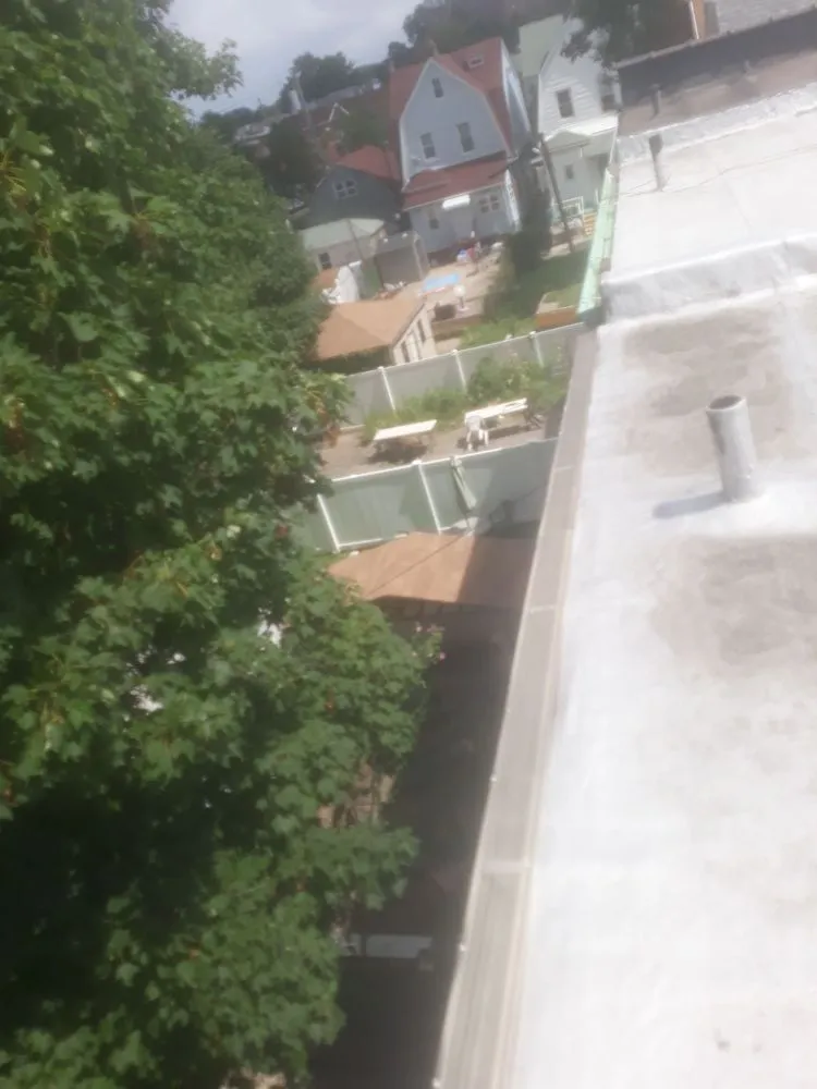 Emergency flat roof repair in South Richmond Hill, NY - Shine Gutter Cleaning And Repair