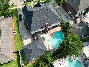 Slide of Shingle Hut Complete Roofing Services