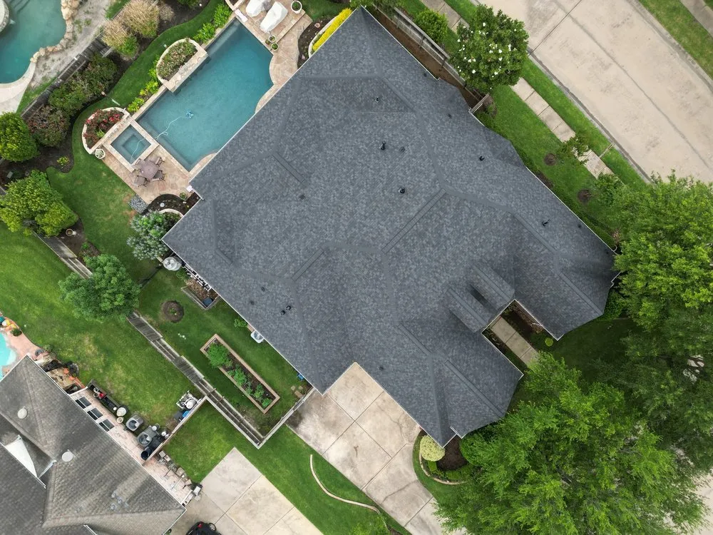 Slide of Shingle Hut Complete Roofing Services