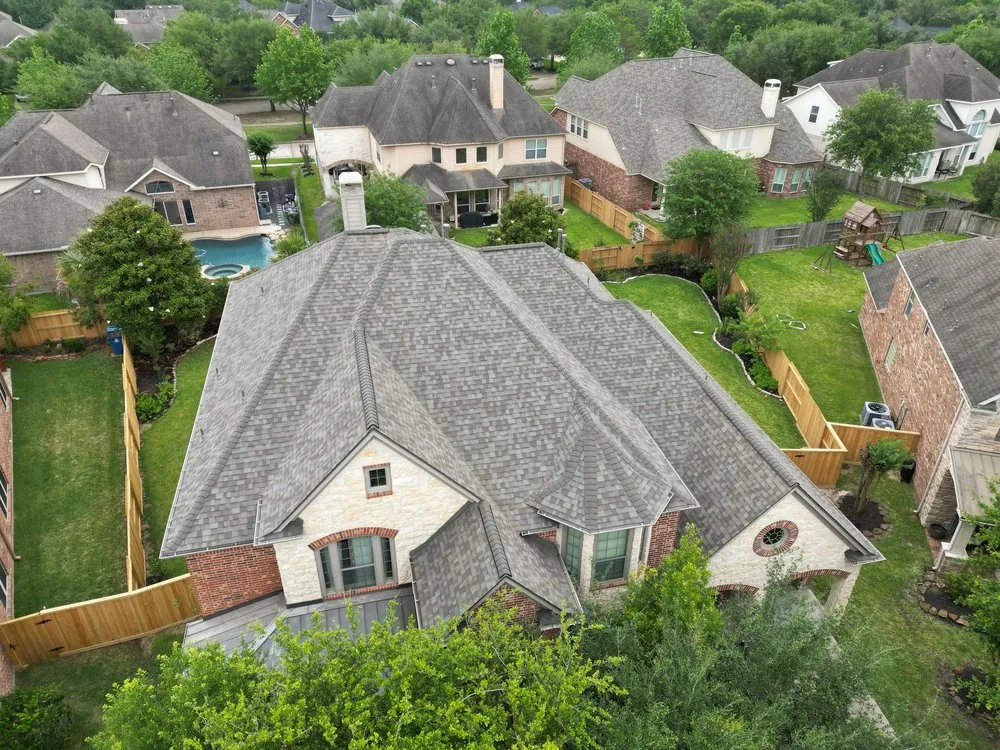 Slide of Shingle Hut Complete Roofing Services