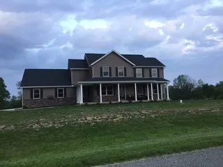 Slide of Shingle King Roofing