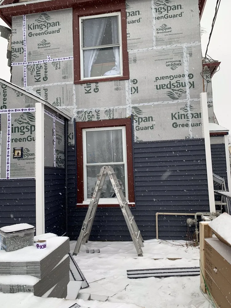 Slide of ShingleMasters Roofing