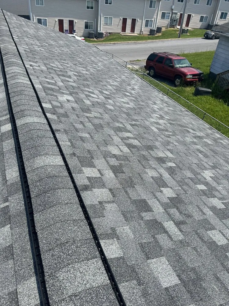 Slide of Shingler on the Roof