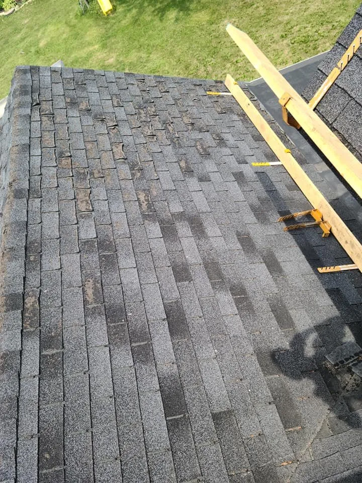 Licensed storm damage roof repair after storm damage in Benton, WI by Shinglers Roofing