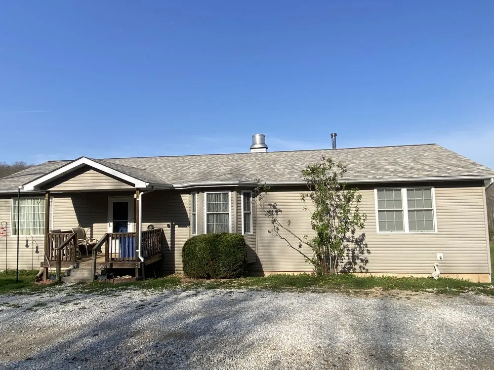 Slide of Show Me Roofing