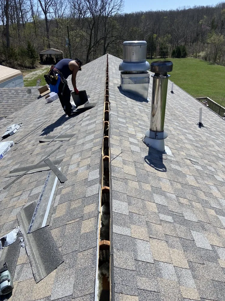 Slide of Show Me Roofing