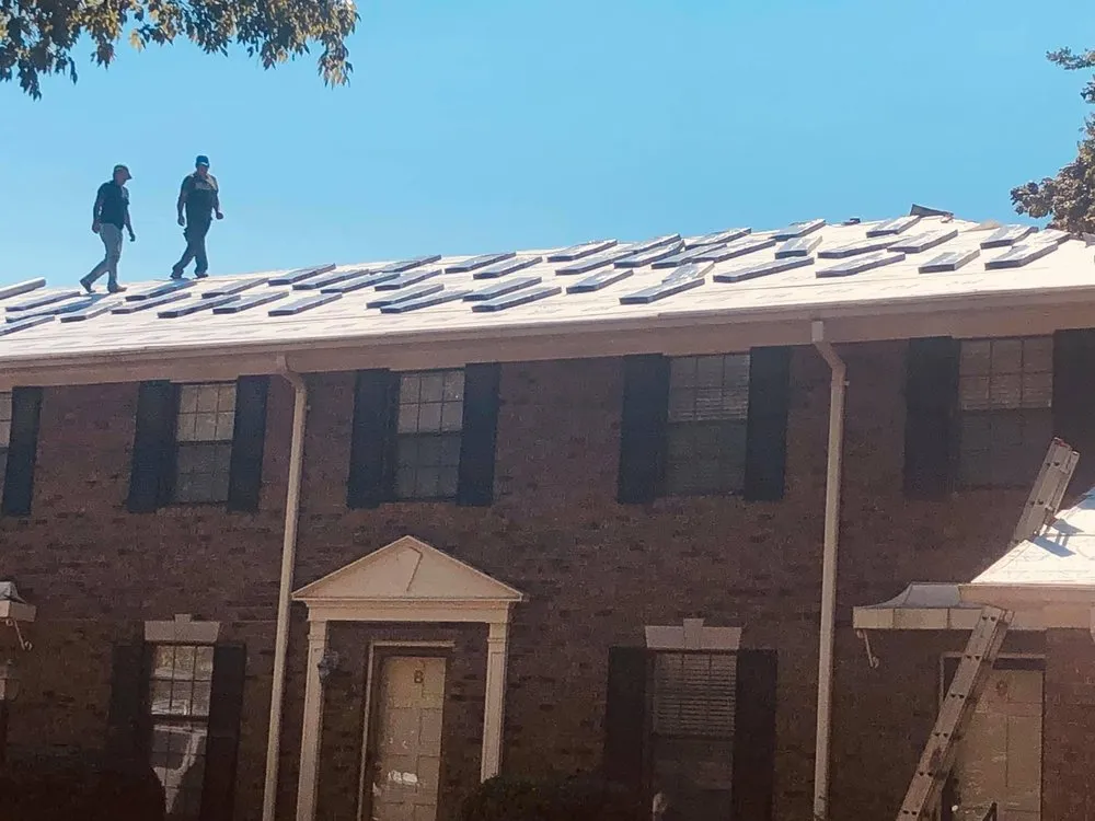 Slide of Shrum's Roofing Company