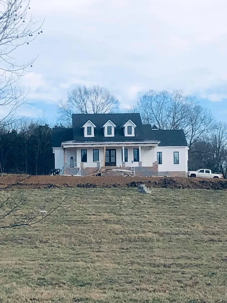 Slide of Shrum's Roofing Company