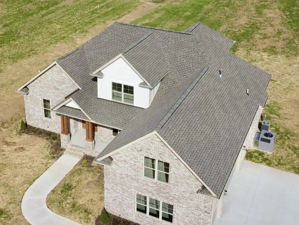 Slide of Shrum's Roofing Company