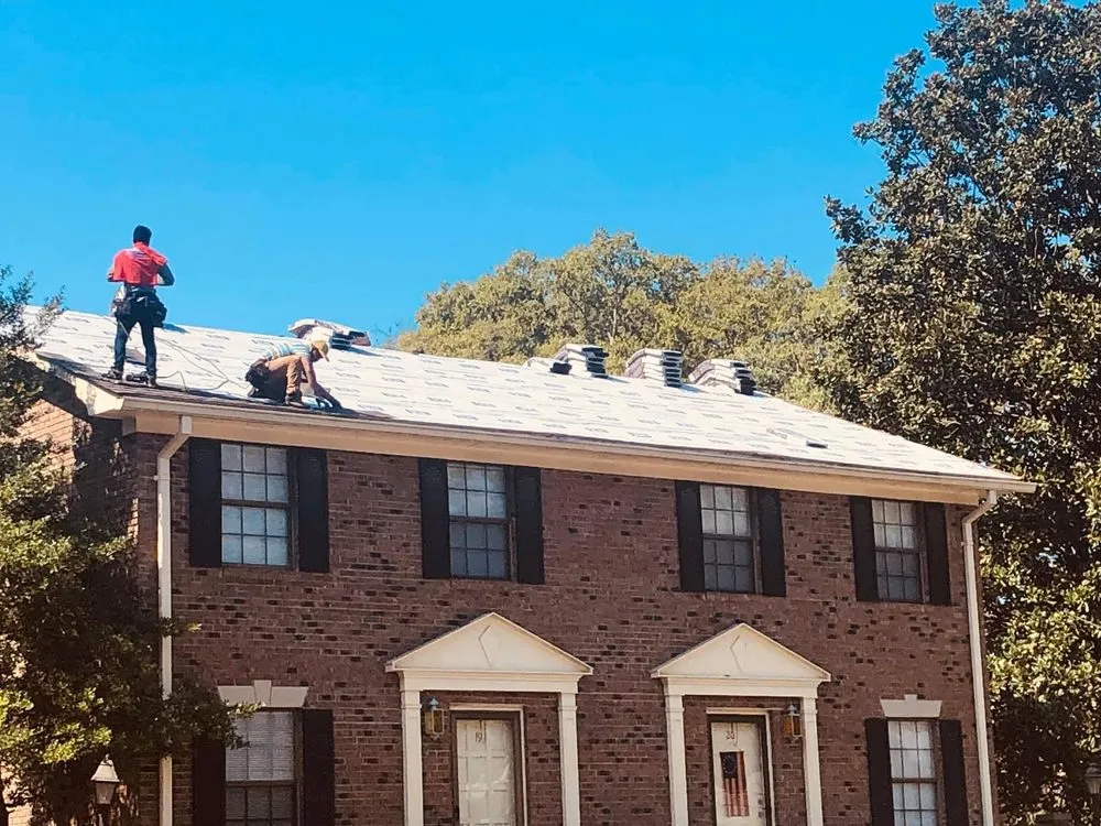 Slide of Shrum's Roofing Company