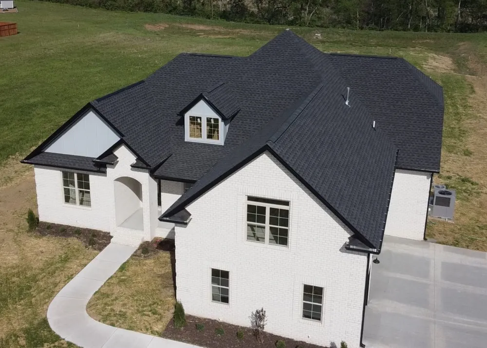 Slide of Shrum's Roofing Company