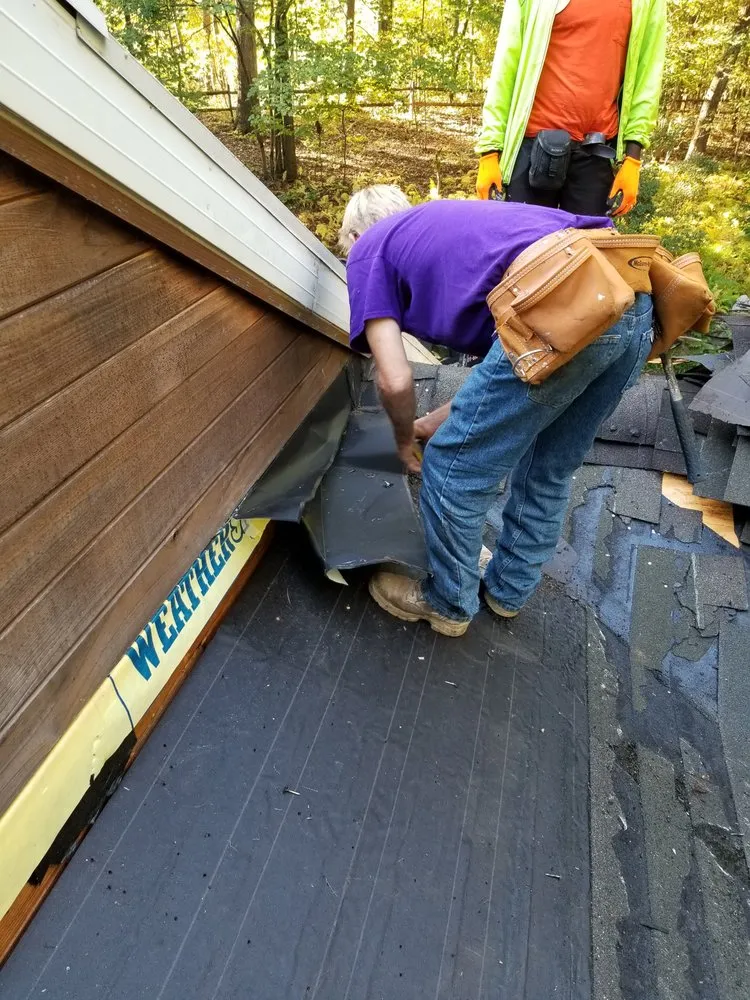 Slide of Shumaker Roofing