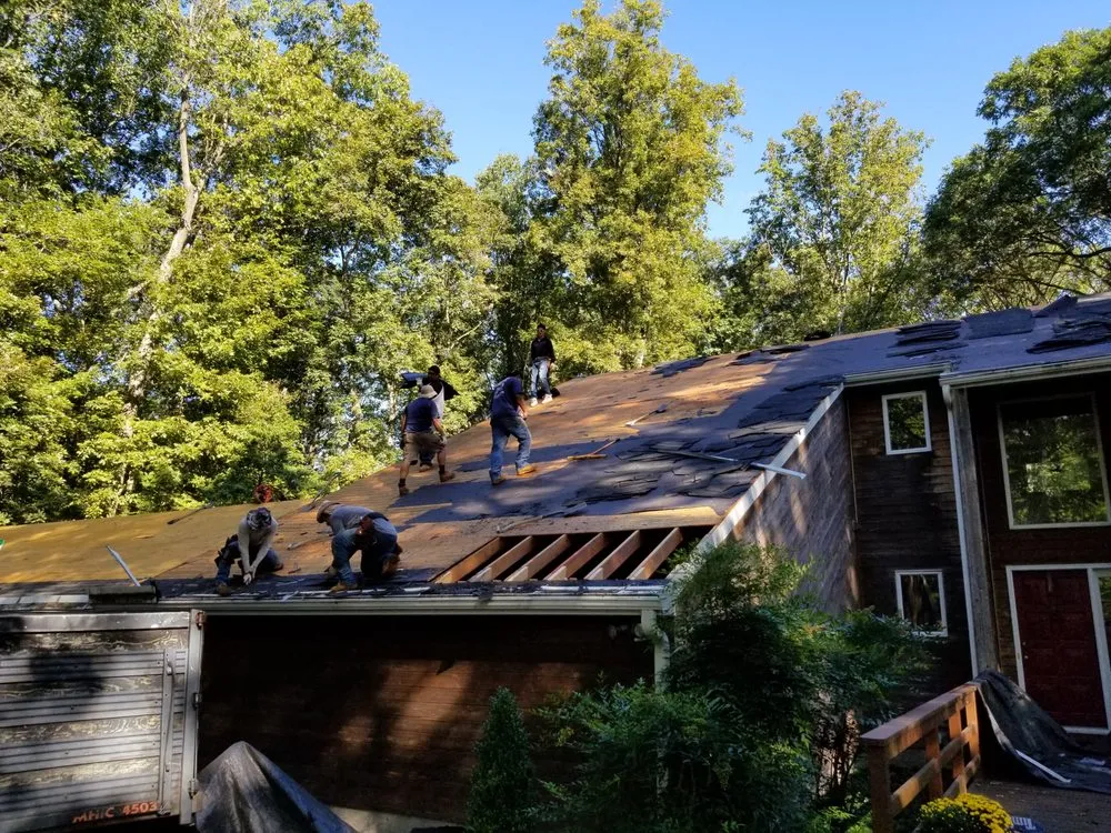 Slide of Shumaker Roofing