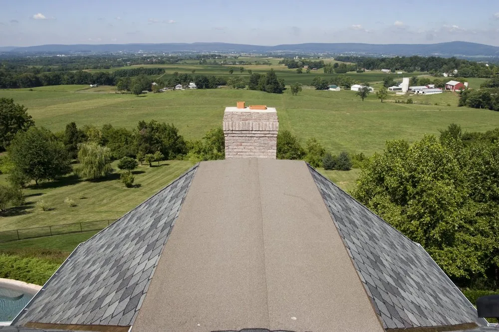 Slide of Shumaker Roofing
