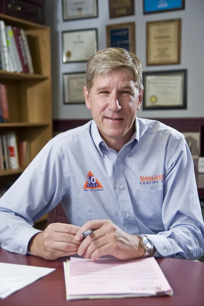 Slide of Shumaker Roofing