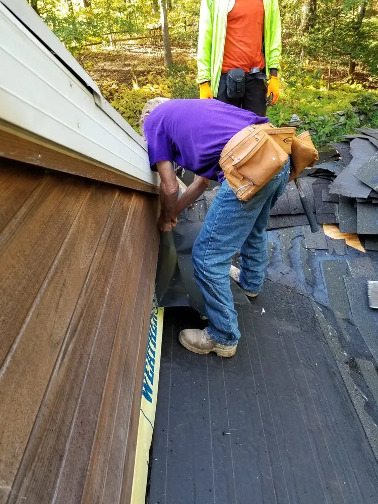 Slide of Shumaker Roofing