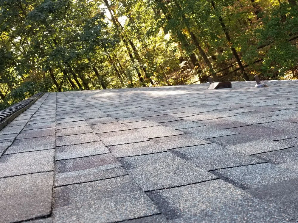 Slide of Shumaker Roofing