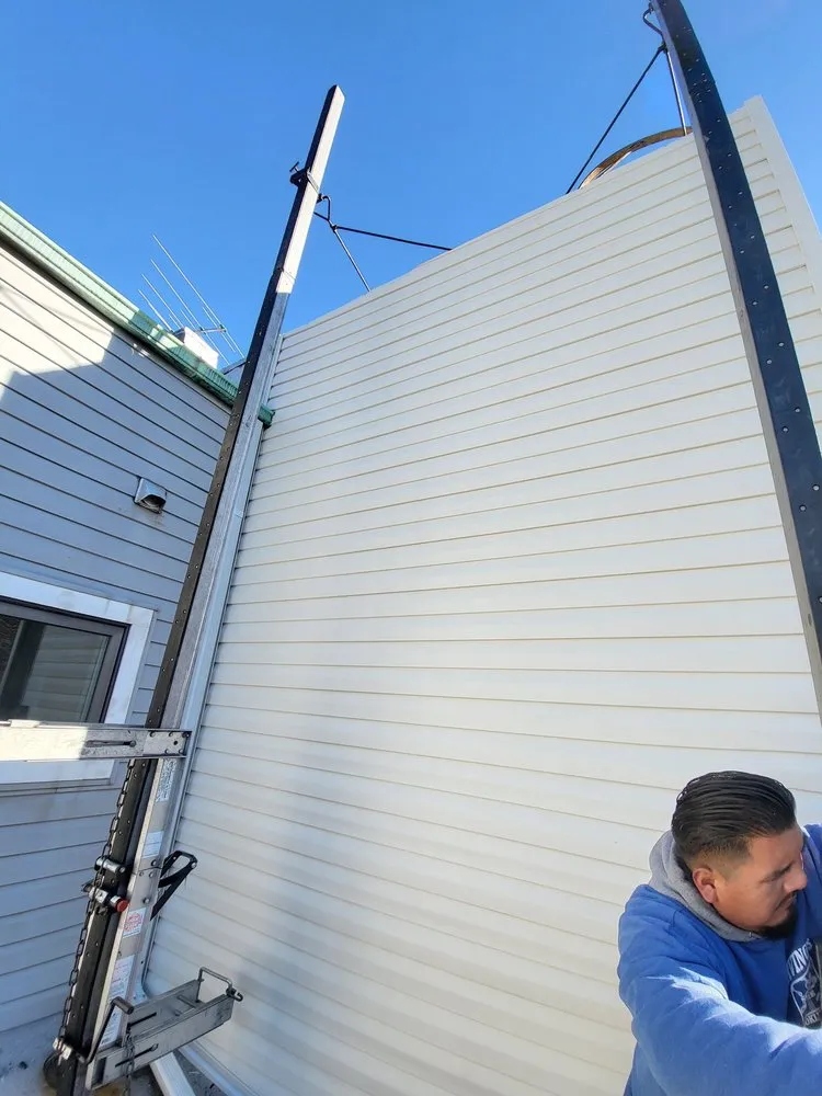 Slide of Side By Side Roofing & Siding Contractors In Brooklyn Ny