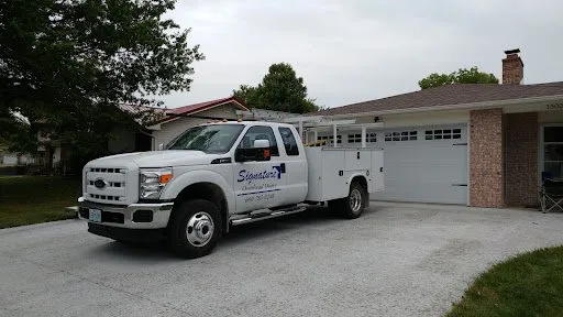 Slide of Signature Overhead Doors and Remodeling