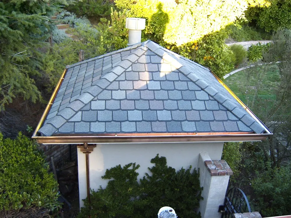 Slide of Signature Rain Gutters & Metal Works