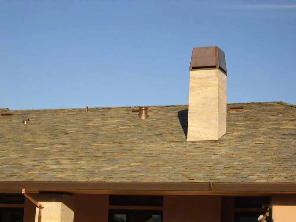 Slide of Signature Rain Gutters & Metal Works