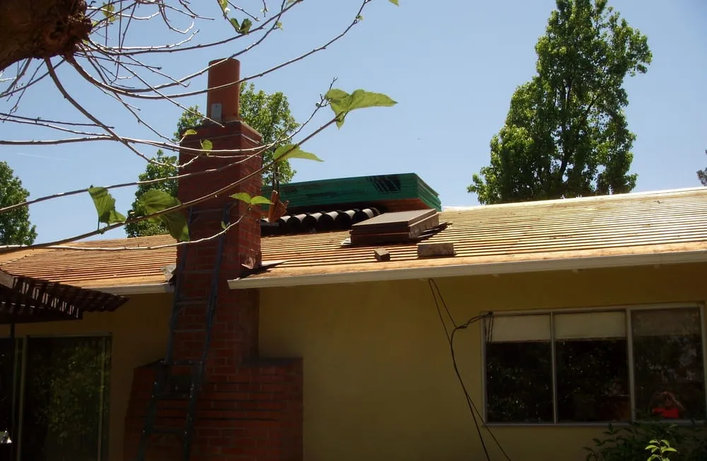 Slide of Signature Roofing