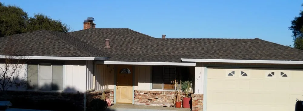 Slide of Signature Roofing