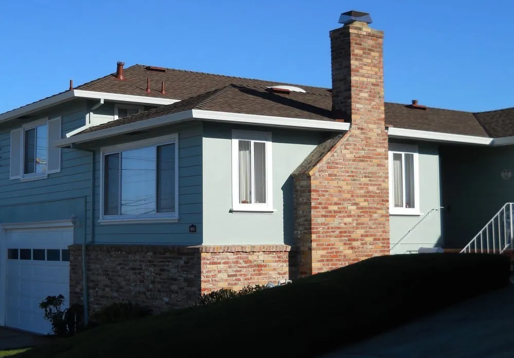 Slide of Signature Roofing