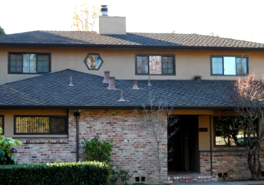 Slide of Signature Roofing