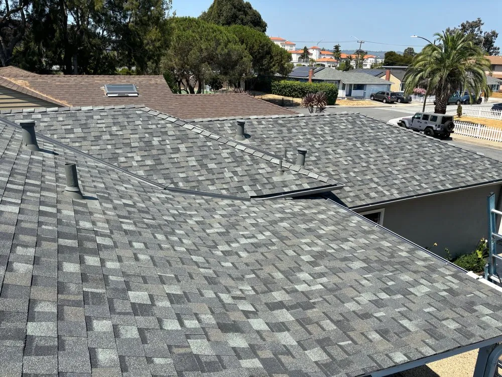 Slide of Signature Roofing