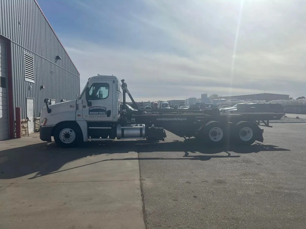 Slide of Signature Roofing