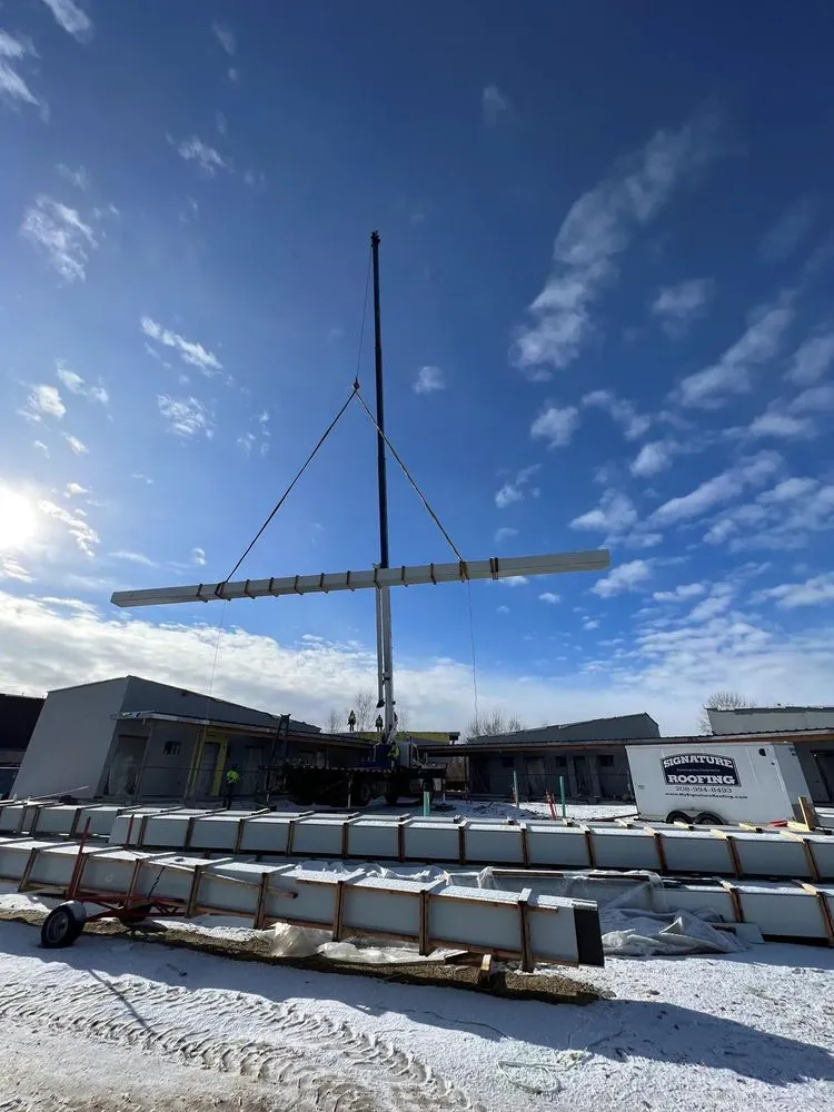 Slide of Signature Roofing