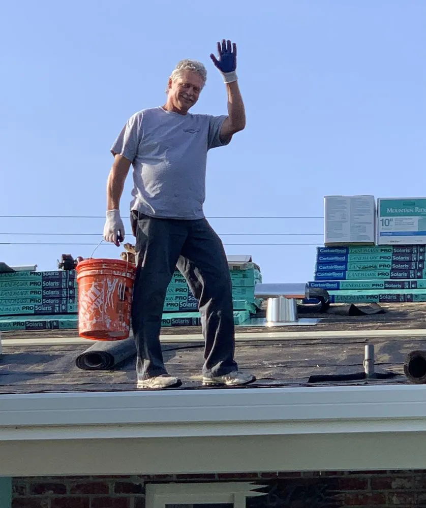 Slide of Signature Roofing