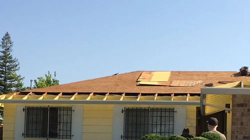 Slide of Signature Roofing