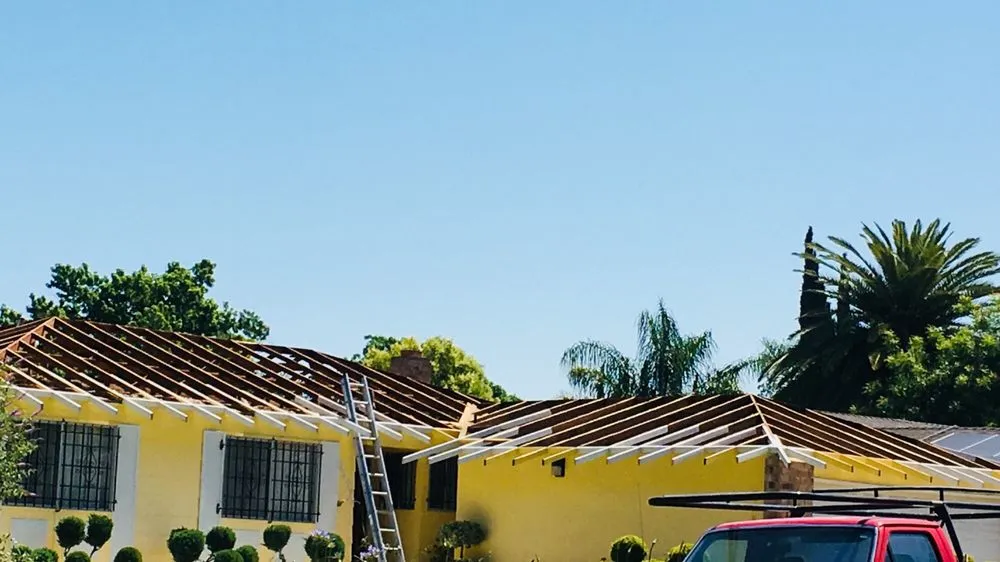 Slide of Signature Roofing