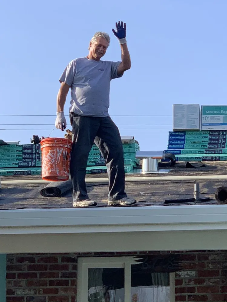 Slide of Signature Roofing