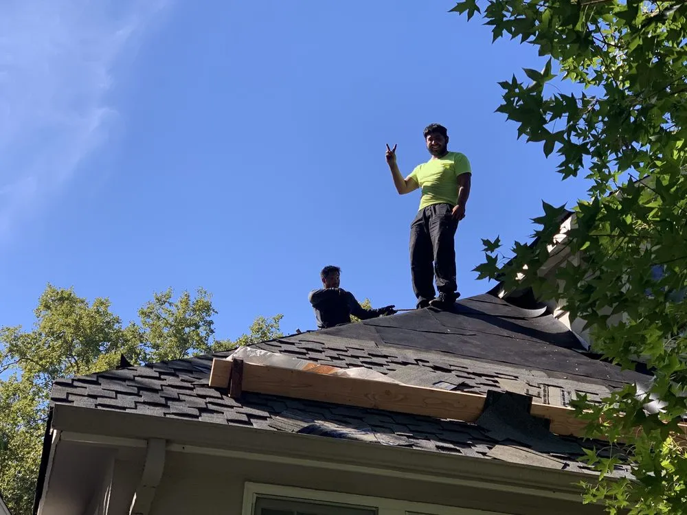 Slide of Signature Roofing