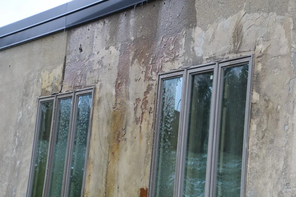 Slide of Silktown Roofing