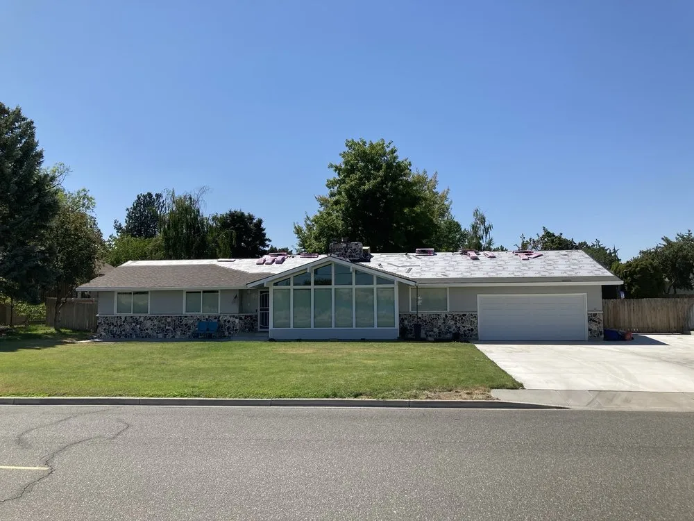 Slide of Silverbow Roofing