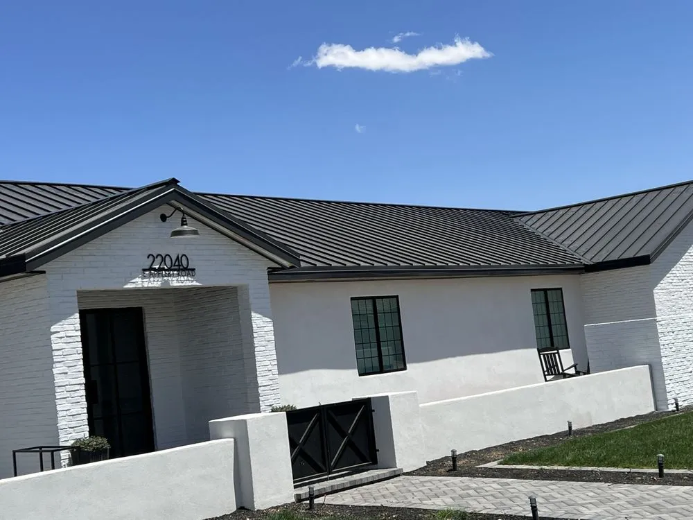 Slide of Simmons &sons roofing