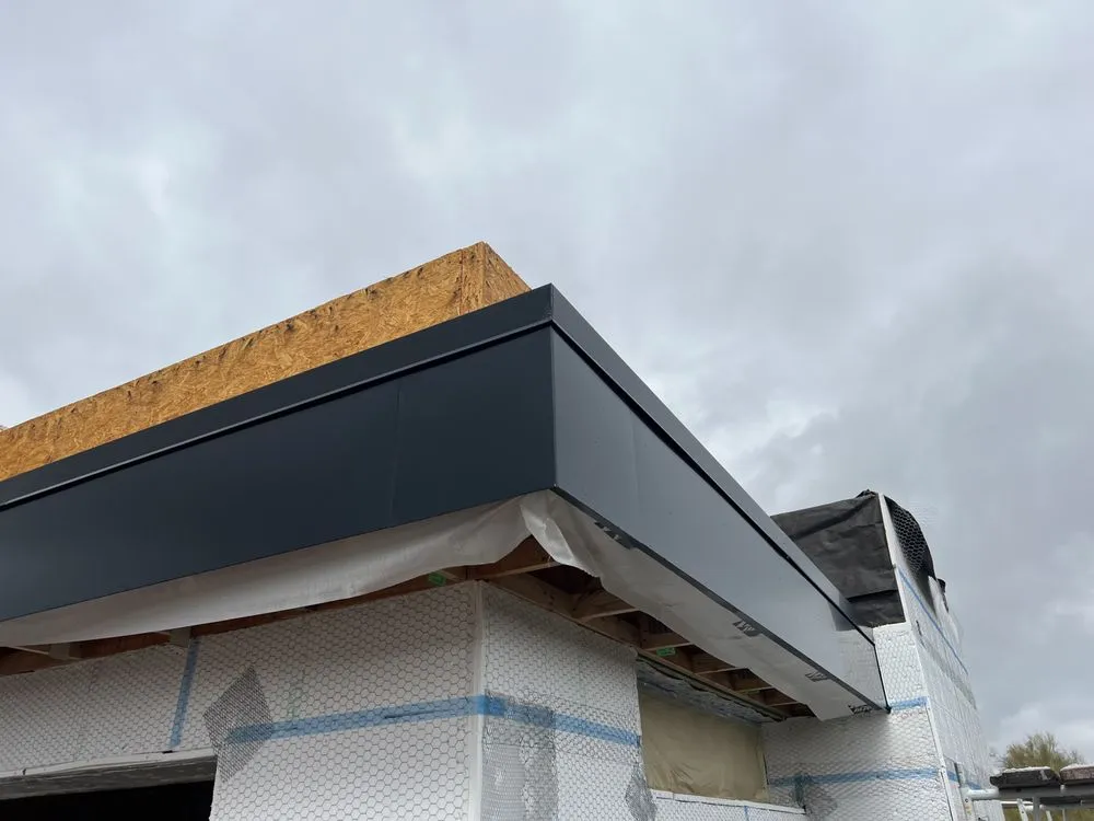 Slide of Simmons &sons roofing