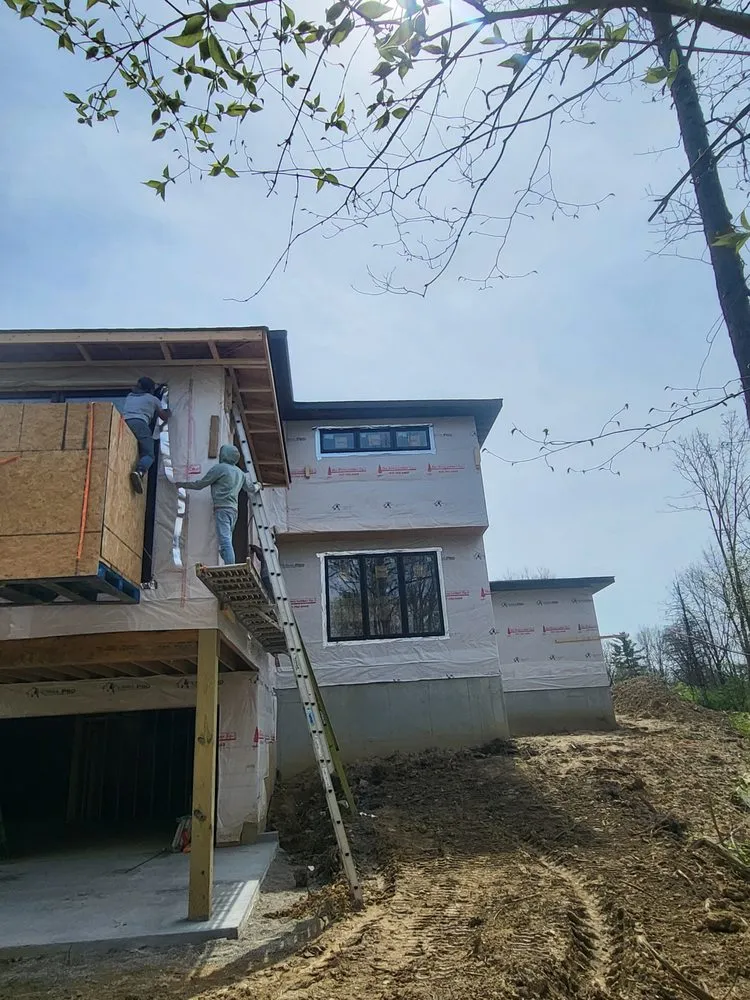 Slide of Simon Jr Roofing