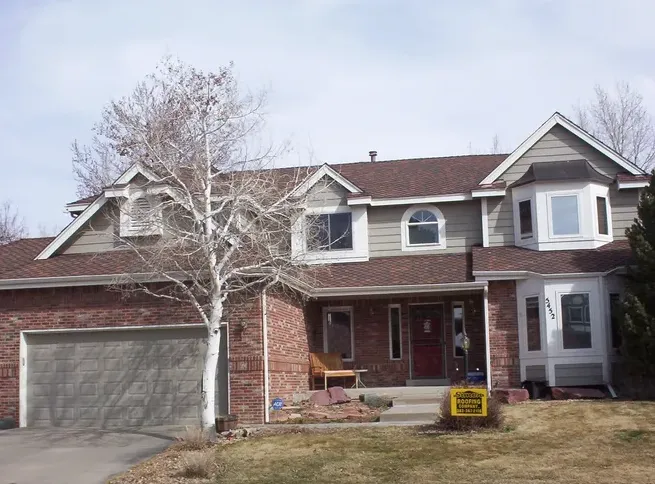 Slide of Simon Roofing