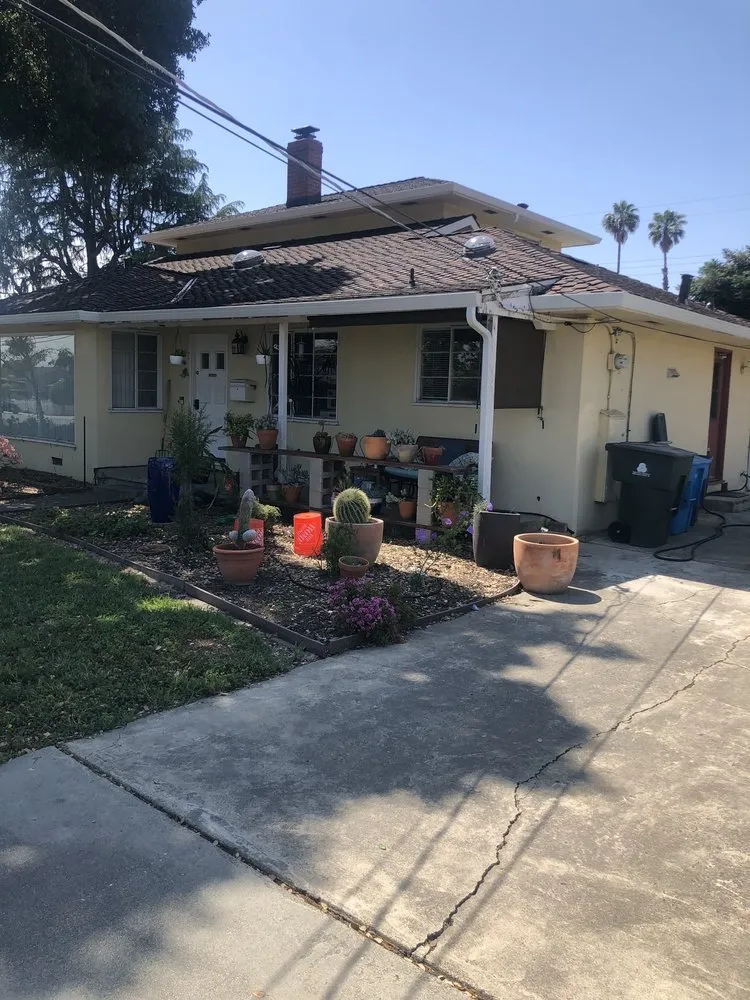 Slide of Simon Says Roofing