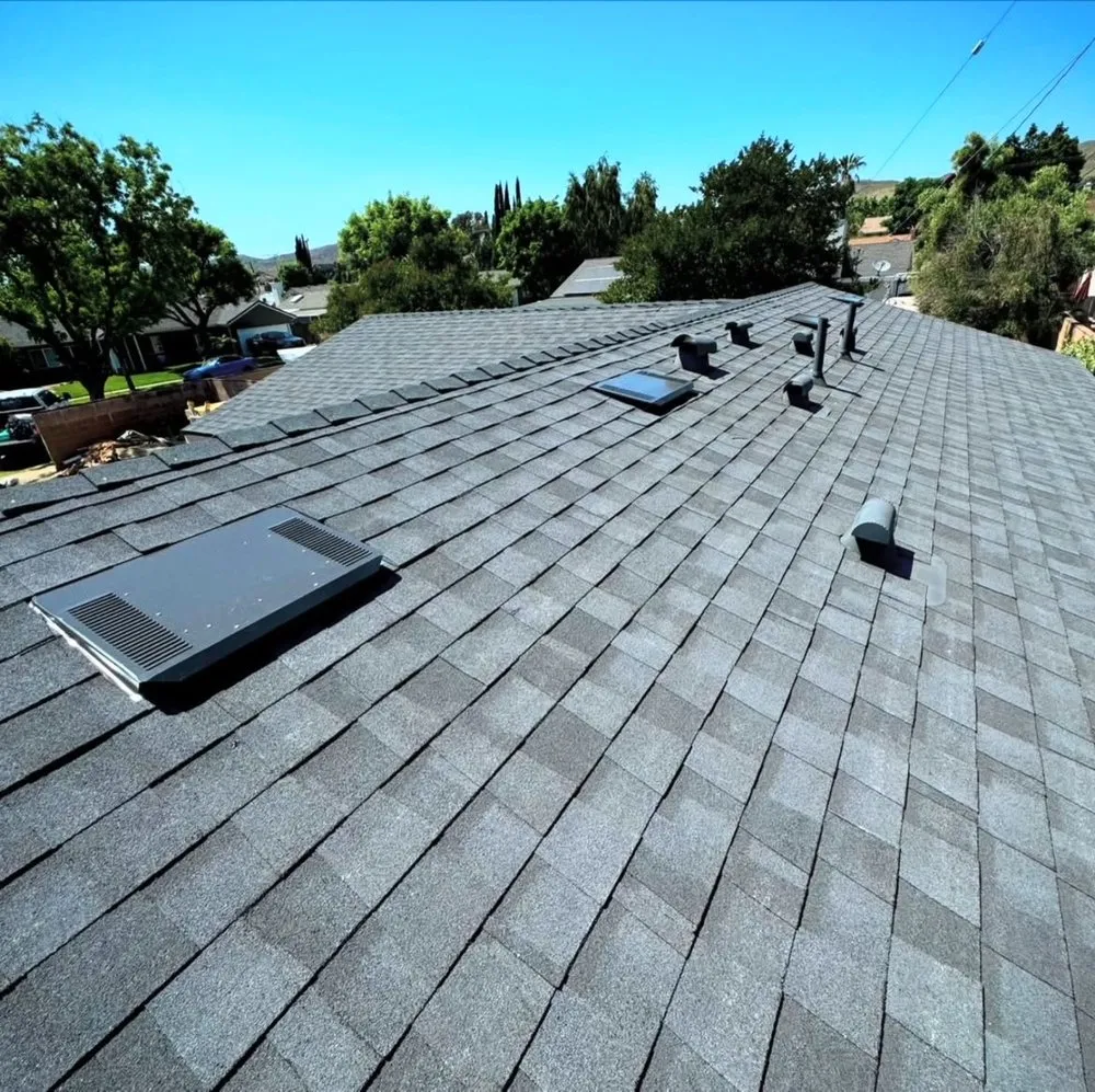 Slide of Simons Roofing Company