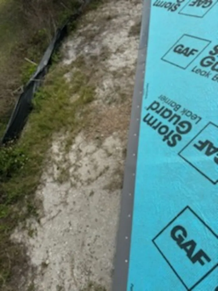 Slide of Sims Roofing